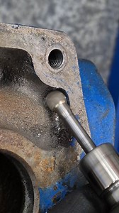 The engine block is quite rough in some places and even contains some sand from the casting. I'm smoothing all these sections out with the die grinder. | my mechanics