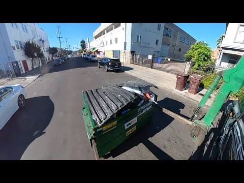 Waste Management commercial front load garbage truck