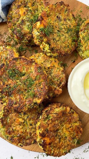 Fuss Free Family Food by Sarah Rossi on Instagram: "🥒🧀 COURGETTE & FETA FRITTERS 🥒🧀 Cheesy, herby, zesty, this recipe will turn the boring (sorry old pal) courgette into something altogether more impressive and delicious. Recipe is from my Meal Plan 25. Click the link in my bio @tamingtwins for all of the recipes and full printable shopping list for the week! #moneysaving #easyrecipe #courgettes #zucchini #zucchinirecipes #fetacheese #feta"