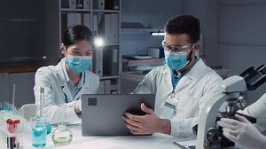 Diverse Biochemistry Students Conducting Experiments at Lab Practice