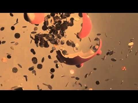 Smashing Piggy Bank With a Sledge Hammer.mov