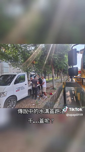 Scooter Towing Process Captured on Urban Street