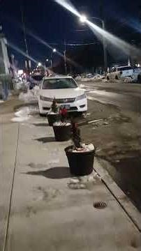 A Volvo tractor trailer with a broken rear axle