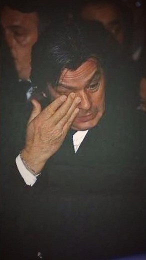 ALAIN DELON. Dalida's funeral.