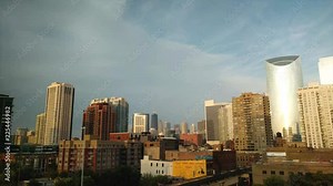A time lapse of a cloudy sunset in Chicago, Illinois. Cityscape with landmark view. Golden hour to Blue hour.