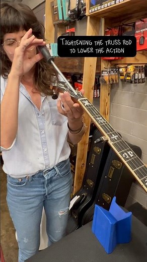 Tightening the truss rod in a banjo to lower the action #workingwednesday #banjo #trussrodadjustment