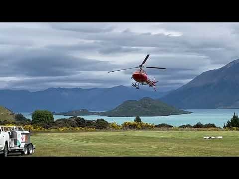Helicopter Landing on a Grass Field | Breathtaking Landscape View