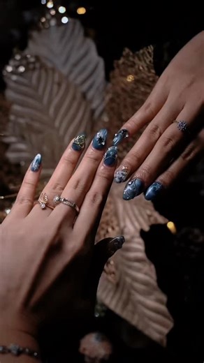 NAILFIE Nailart Studio on Instagram: "Hanging ornaments, nails on point! ❄️ The blend of blue and crystal accents gives off a graceful and classy Christmas vibe. It’s all about the sparkle this holiday season!🎄✨☃️"