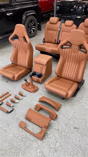 Tan fluted RXI seats with matching rear seat retrim and accessories all in tan leather. We can’t offer complete seats or a retrim service on your existing interior which can be far more cost effective. If you are looking to upgrade your Defender interior then please drop us an email and we can help! Info@lucari-solutions.co.uk #lucari #lucarisolutions #landrover #landroverdefender | Lucari Solutions