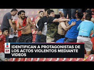 LO ÚLTIMO: Detienen a 10 hombres por la pelea entre aficionados en el Querétaro vs Atlas