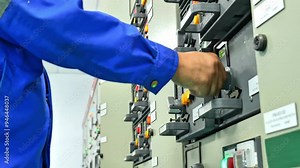 Substation Building Electrical Engineer Conducting Daily Checks on Equipment for City Power Distribution, Advanced Industrial Technology, Reliable and Safe Operations