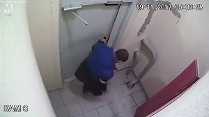 Hilarious moment caught on CCTV as drunk man kicks at door