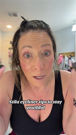 Stila Eyeliner to create youthful, lifted eyes. Tips: tightline, soft brown, minimal smudge, and gentle wings. @Stila Cosmetics #StilaEyeliner #MakeupOver50 #YouthfulEyes #EyelinerTips #BeautyHacks