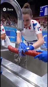 Women's Olympic Kielbasa Washing Competition! . . . . . . . . . #funny #olympic #sora #ai #sports #fbreel #comedy | Robot Sandwich