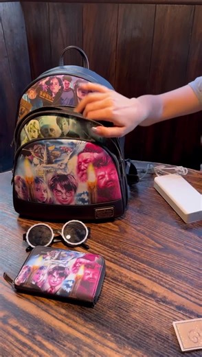 POV: Your packing for a trip to the Wizarding World! Pack your wands and much more in the new #Loungefly Harry Potter Trilogy Triple Pocket mini backpack (13.75" height) and wallet available now on Loungefly.com!✨ Shop: https://bit.ly/3vSNF5x | Loungefly