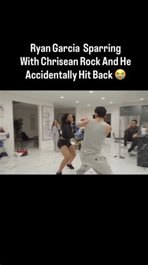 RTN Miami on Instagram: "#RTN: Ryan Garcia took Chrisean Rock under his wing to box after she got JUMPED in Compton, as he sparred with her 🥊 Ryan accidentally hit her back as reflex 😭👀"