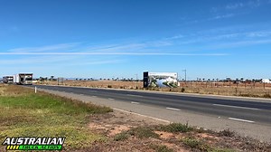 Two HiSpec Heavy Haulage Transport Volvo 700 Globetrotter prime movers hauling two oversize loads of transportable buildings, heading north out of Adelaide on Port Wakefield Road, with pilot vehicles and official police escort. #australiantruckaction #truckspotting #truckvideos #oversize #bigloads #volvo #volvotrucks | Australian Truck Action