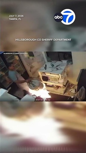 Man wields flaming propane tank inside restaurant