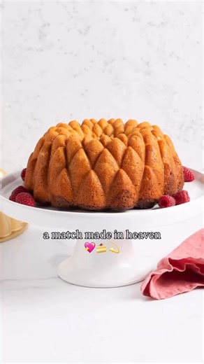 Almond raspberry = a match made in cake heaven 💖 Tender almond Bundt with a sweet-tart raspberry swirl and a glaze that flows perfectly down every curve of our Kaleidoscope Bundt Pan. Save this show-stopping bake for your next celebration! 🎉 🍰Full Recipe: https://www.nordicware.com/recipes/almond-bundt-cake-with-raspberry-filling/ | Nordic Ware