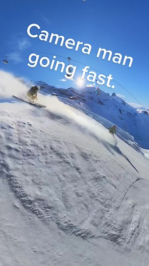Extreme Skiing with High Speed Camera Man