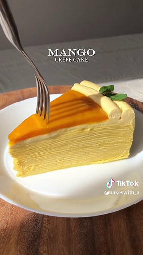 First attempt at making a crêpe cake, would of added more cream in the layers but was still delicious🥭💛🧡 #ramadan #ramadandesserts #crêpe #crêpecake #cake