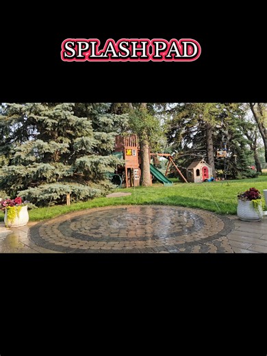 Splash pad in residential patio. This landscaping feature creates joy and relaxation. An amazing place to play in the water, without the expense of a pool. When not being played in they're great for the relaxing noise of water. When it's not on it becomes usable patio space. It's also Eco-friendly, the water is stored and re-circulated, and can be filled and maintained with rain water. #water #waterfeature #splashpad #landscaping #outdoorliving