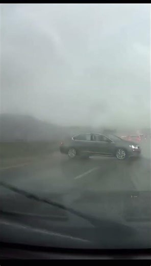 POV: The Car Ahead Hydroplanes and Spins Right in Front of Me #shorts