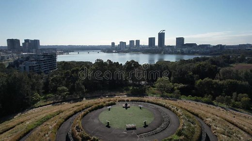 Drone Footage of a Spiral Walkway Up a Hill in Sydney Olympic Park, Australia Stock Video - Video of olympic, lake: 261326369