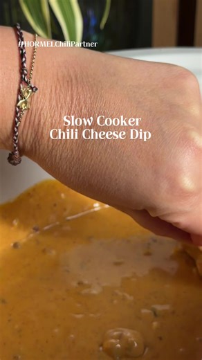#HORMELChiliPartner I’m begging you to make this for your next party because this slow-cooker chili cheese queso NEVER survives the night. It’s creamy, cozy, and stupid easy thanks to @HORMEL®️ Chili , which already brings all the flavor. Dump it, melt it, walk away… that’s the whole vibe. Serve it with chips, mini hotdog sliders, little mac-and-cheese cups, or crispy potato bites and watch people absolutely lose it. Save this now because this is the dip everyone asks for. ⭐️ INGREDIENTS ⭐️ 🧀 1
