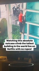 Watching this absolute nutcase climb the tallest building in the world live with no ropes! #Netflix #skyscraper #viral #ReelTrend | The Sesh Life.