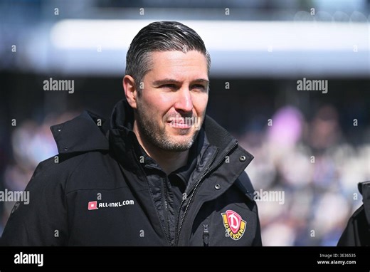 Paderborn, Germany. 21st Mar, 2026. Soccer, Men: Bundesliga 2, SC Paderborn 07 - Dynamo Dresden, Matchday 27, Home Deluxe Arena: Coach Thomas Stamm (Dynamo Dresden) stands in the stadium. Credit: Swen Pförtner/dpa - IMPORTANT NOTE: In accordance with the regulations of the DFL German Football League and the DFB German Football Association, it is prohibited to utilize or have utilized photographs taken in the stadium and/or of the match in the form of sequential images and/or video-like photo ser