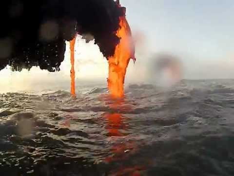 Amazing footage of lava creating a black sand beach