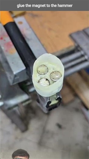 glue the magnet to the hammer