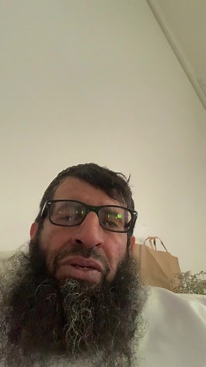 Close-Up Portrait of a Bearded Person Indoors