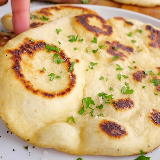 Vegan Naan Recipe: https://jessicainthekitchen.com/vegan-naan-bread-recipe/ Learn how to make easy Vegan Naan (Indian flatbread), from scratch! It’s pillowy soft and fluffy, and so delectable. Homemade naan is the perfect side for everything from curries to soups, and you can even use it for wraps! | Jessica in the Kitchen