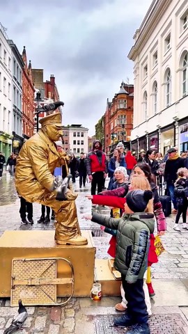How London Levitating Goldman is starting the day with the pigeons and the little angels.