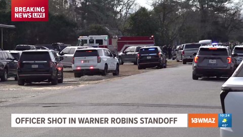 A live look, as GBI crime scene unit arrives to scene where WRPD officer shot