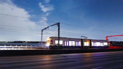 Sound Transit light rail train crosses I-90 floating bridge in historic test
