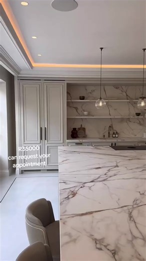 Sculptural Black Granite Kitchen Island Design