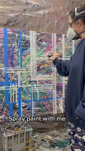 Creating Vibrant Spray Paint Art in an Studio