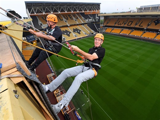 Wolves legends and thrill-seekers get a unique view of Molineux in charity abseil off stadium roof