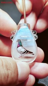 Arts comes alive on palm-sized bottles! 🥃 Chinese artists weave their talents into heritages, as they carefully wield the brush for delicate inner paintings inside snuff bottles, a traditional Chinese handicraft 👨🏻‍🎨👩🏻‍🎨 | People's Daily, China