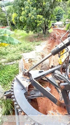 Shaping the Slope: How a Laser-Guided Grader Defines the Edge