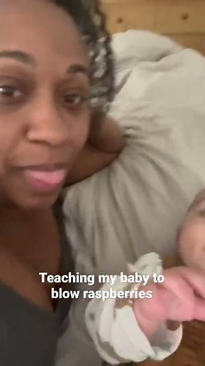 Teaching my 5 month old baby to blow raspberries.