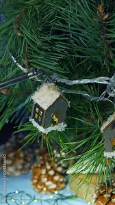 Artificial intelligence robot decorating Christmas tree. Modern robotic equipment hang toys on a fir tree. Robotic industry. Vertical video
