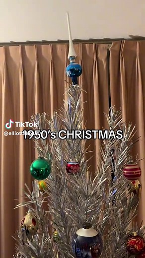 Stepping back to 1957 with my gorgeous aluminum Christmas tree and its iconic spinning color wheel! 🌟✨ This mid-century beauty shines in all its metallic glory, reflecting the vibrant reds, greens, blues, and yellows of the wheel. A true blast from the past and a perfect touch of nostalgia for the holidays. Who else loves vintage Christmas decor? 🎄 Aluminum Christmas trees were a popular holiday trend in the 1950s and 1960s, and your 1957 version is a classic example of mid-century holiday dec