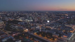 Download Yekaterinburg, Russia - August 15, 2022. Evening aerial view Yekaterinburg center metropolis. Metropolis Yekaterinburg blend of skyscrapers Ural heritage Metropolis urban architecture.