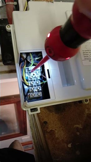 Testing a fuse to a boiler.