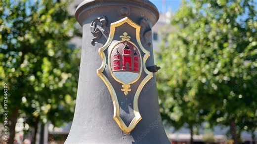 Detail view of a shield on a street lamp in Copenhagen, Denmark