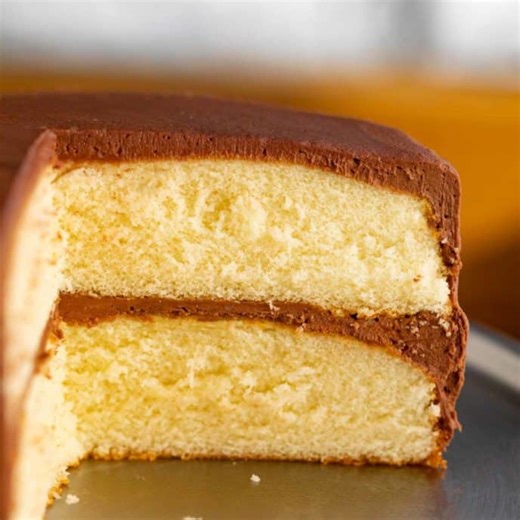 FULL RECIPE: https://dinnerthendessert.com/classic-yellow-cake/ Classic Yellow Cake is an old fashioned dessert recipe made with milk, flour, sugar, eggs, and butter, and flavored with vanilla extract, ready in under 60 minutes! We know how important it is to have the best possible Cake Recipe when holidays or birthdays come around, and this yellow cake goes perfectly with Rich Chocolate Frosting, Easy Whipped Cream, or Chocolate Ganache. | Dinnerthendessert.com